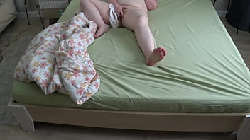 Curvy wife caught on home cam, fingering herself to a creamy climax in white panties before bed.