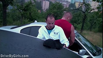 Exposed and ready: a public roadside gangbang with a willing girl offering herself from the car window.