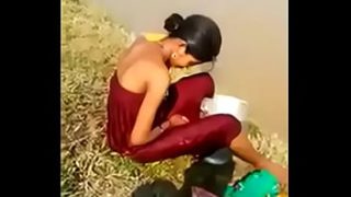 Desi Bhabhi Exposed in Open Bath