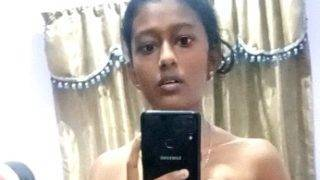 Tamil babe spreads her legs and fingers her wet slit in a steamy solo MMS