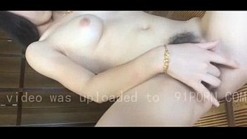 Sexy Asian babe in glasses gets herself off