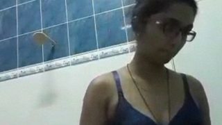 Sultry Tamil Nurse Sheds Her Uniform to Tease Her Luscious Bush