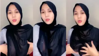 Tante Berjilbab Hitam Menggoda dengan Gaun Transparan yang Membangkitkan Nafsu