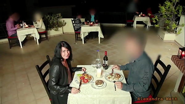 Unveiling his massive arousal amidst the bustling restaurant crowd…