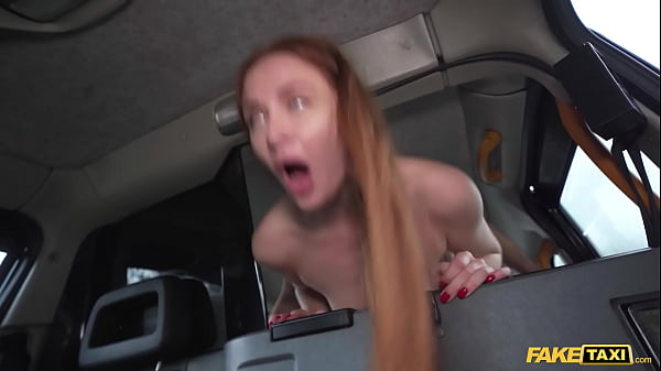 Sultry Redhead MILF in Sheer Nylons Takes a Thick Ride in the Back of a Cab