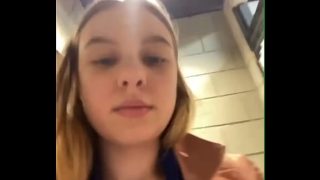 Exposed woman pleasuring herself in a crowded place