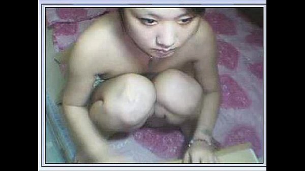 Little Chinese cutie opens wide for the camera