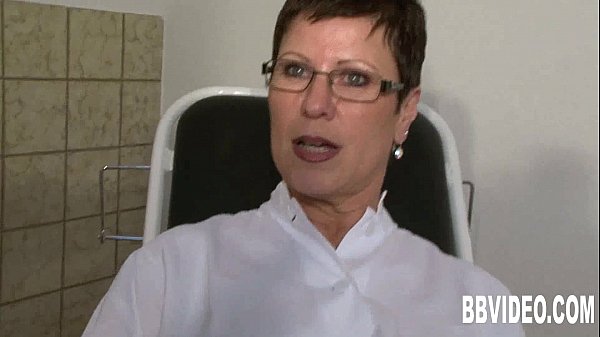 German milf fingering her wet pussy